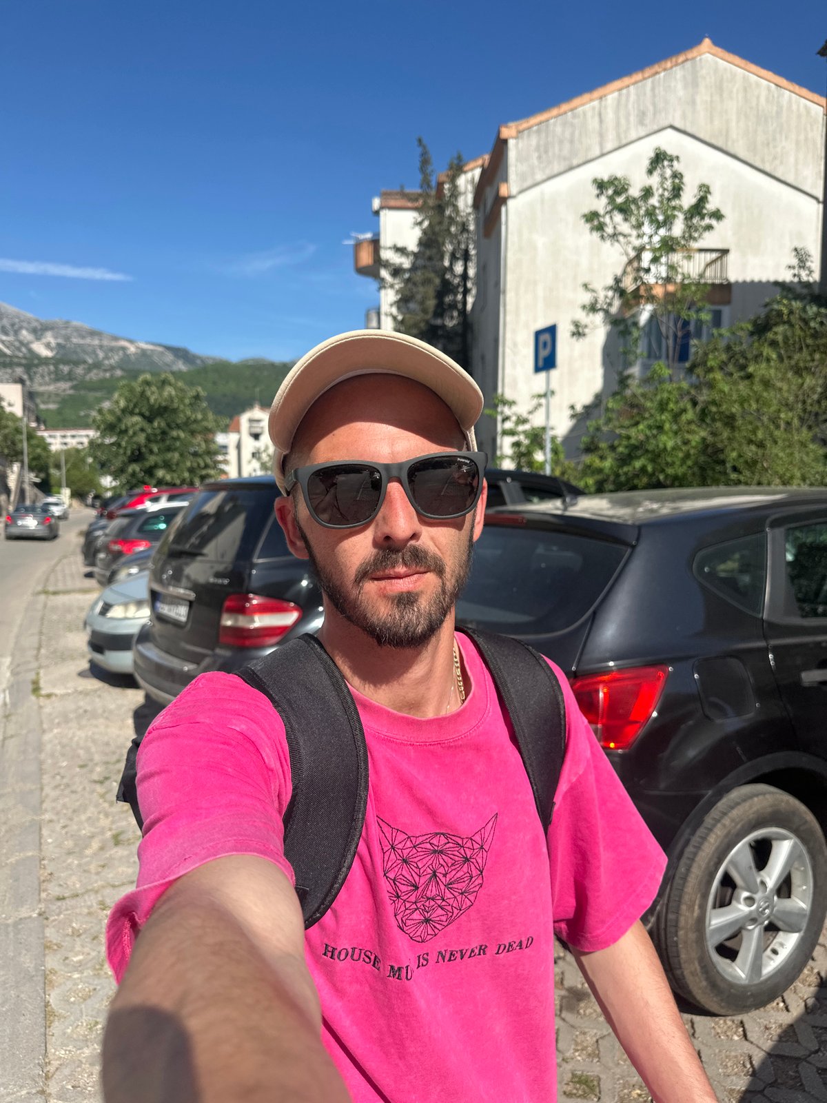 Tourist documents street scenes and shopping in Budva, Montenegro