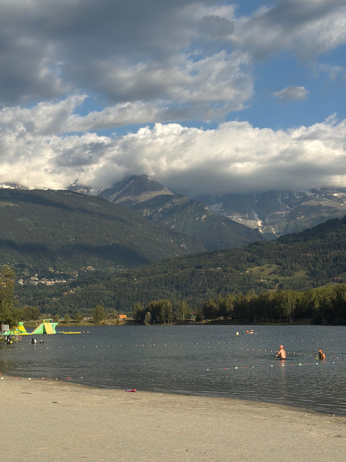 Summer afternoon at Lac de Passy's sandy beach
