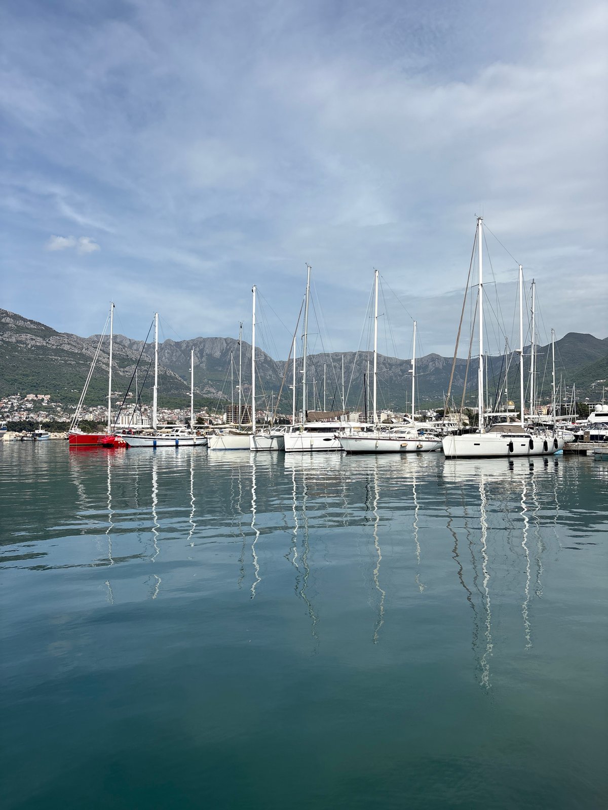 Cargo ship and sailboats observed at Bar Montenegro harbor
