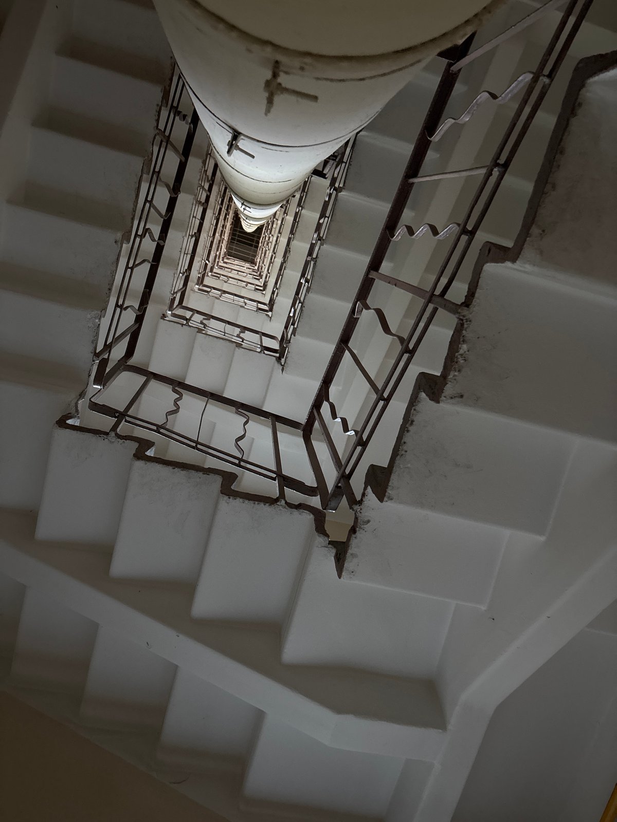 Upward view of decorative stairwell captured in Sinyavino, Russia