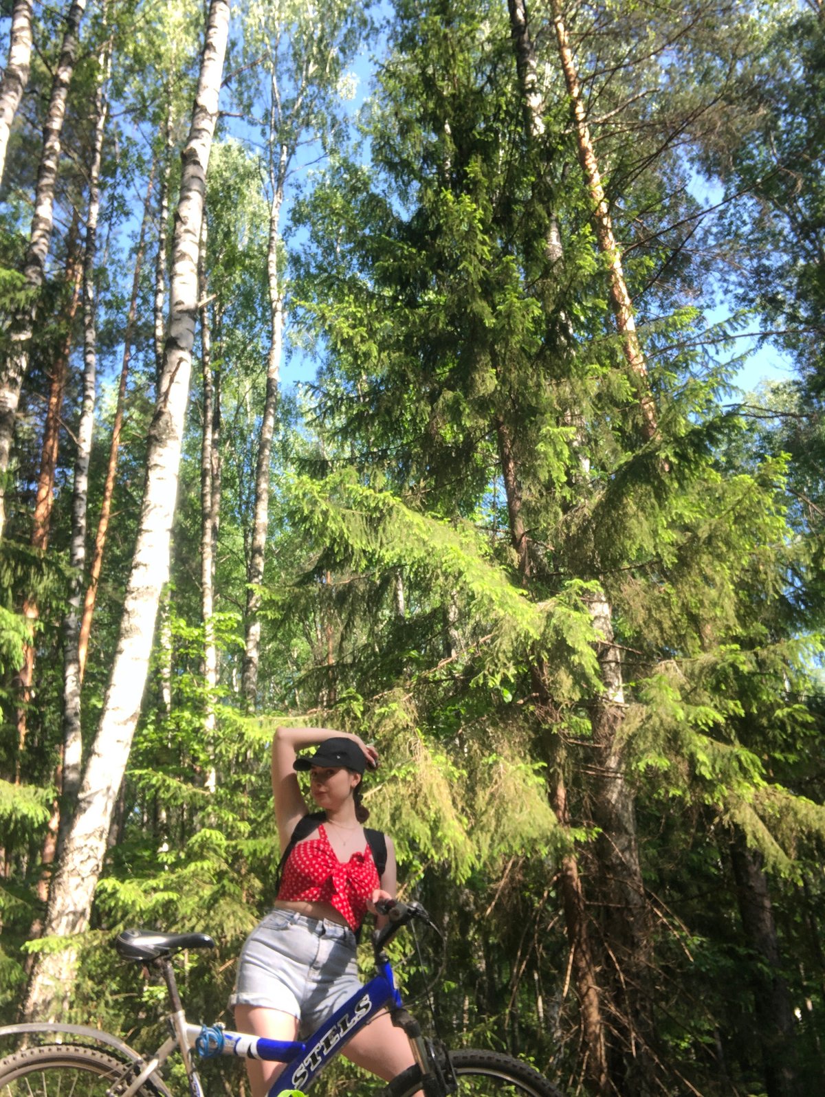 Woman with bicycle observed in forest near Noviy, Russia