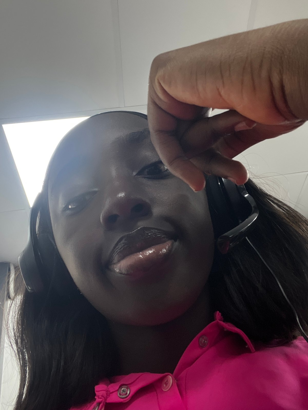 Woman Takes Playful Selfies in Elevator in Karum, Nigeria