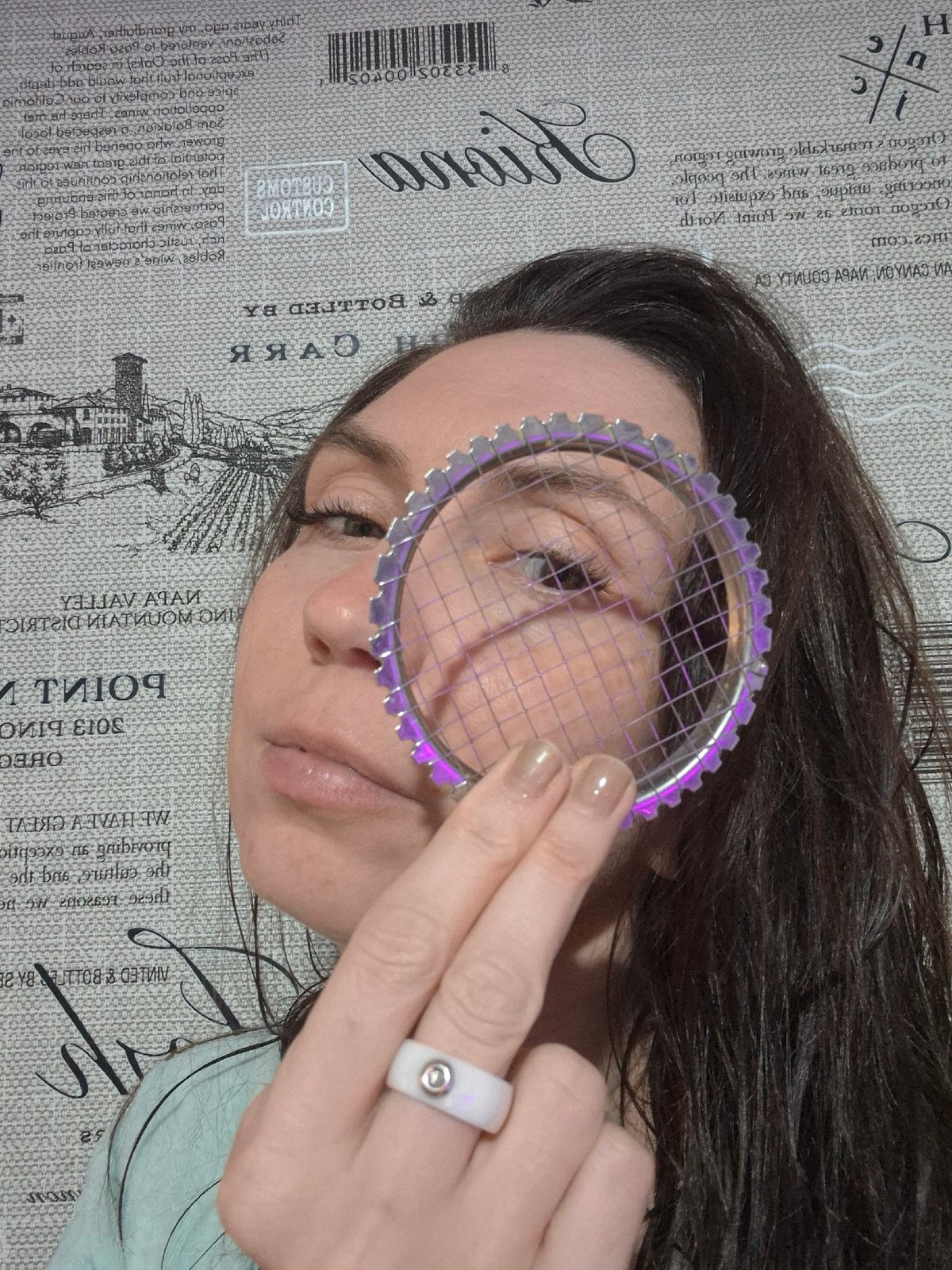 Person experiments with objects covering face in artistic photos
