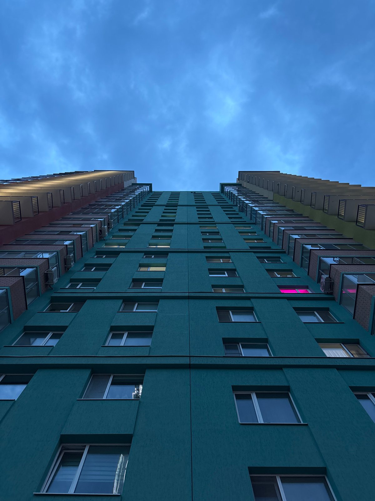 Colorful apartment buildings photographed from below in Perm, Russia