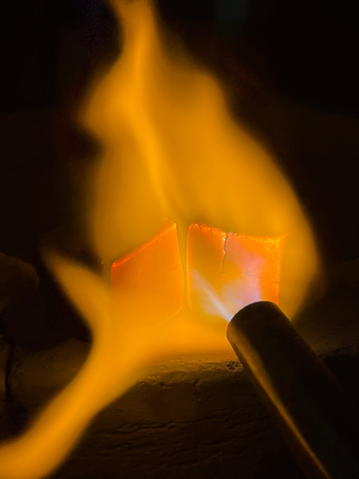 Blowtorch heating and melting material in Nha Trang