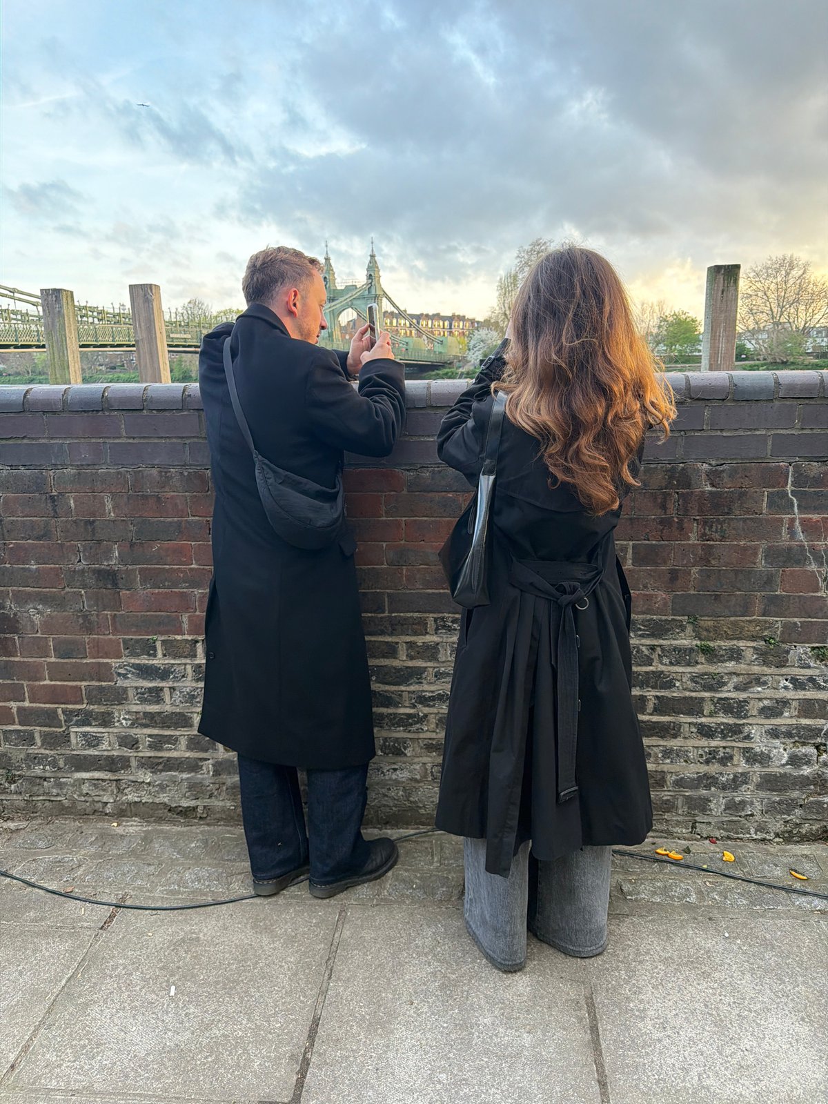 Two people spotted standing by Hammersmith Bridge railing