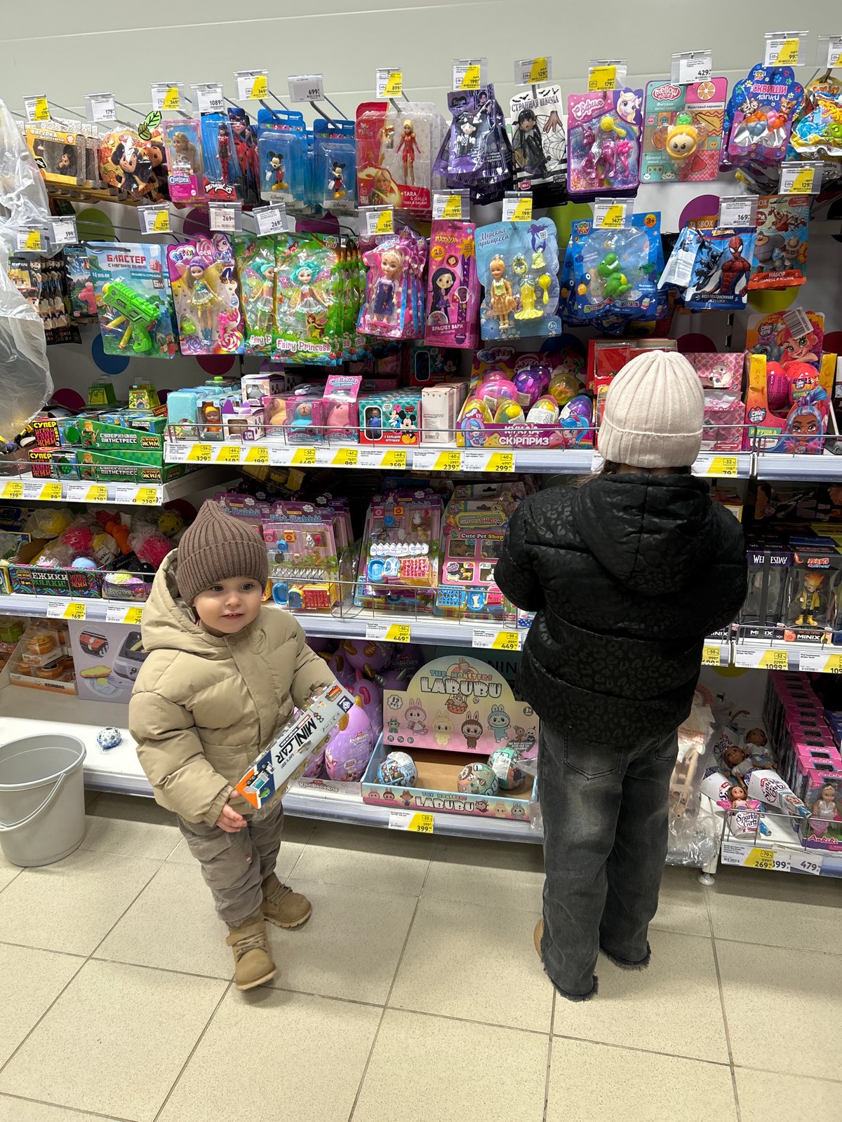 Children browse toy aisle in Klin, Russia store