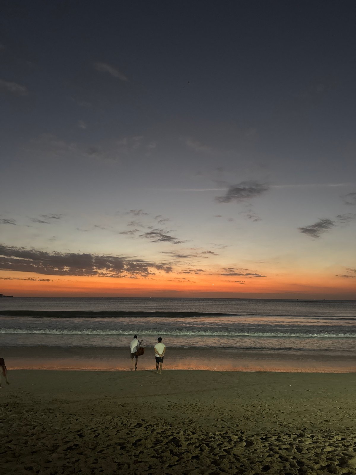 Sea turtle hatchlings reach the ocean at dusk, Kuta Selatan
