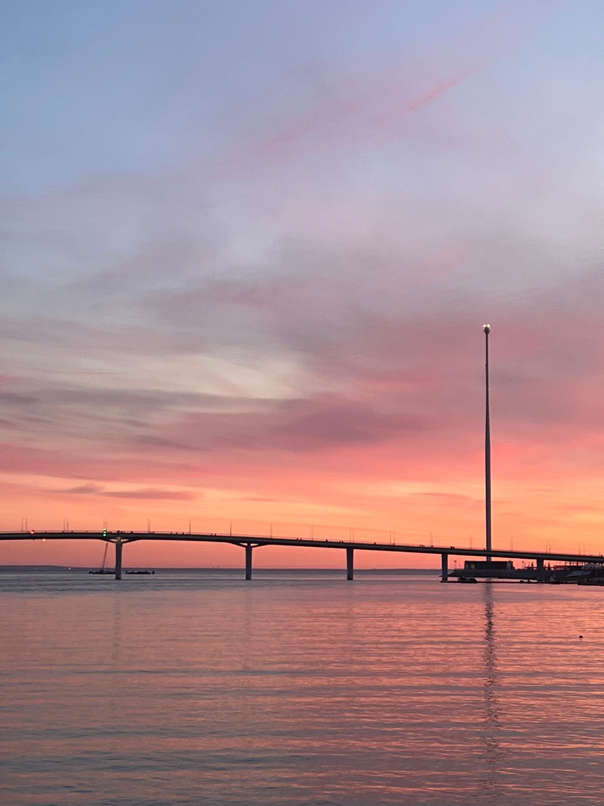 Sunset captured over Saint Petersburg waterfront bridge April 21