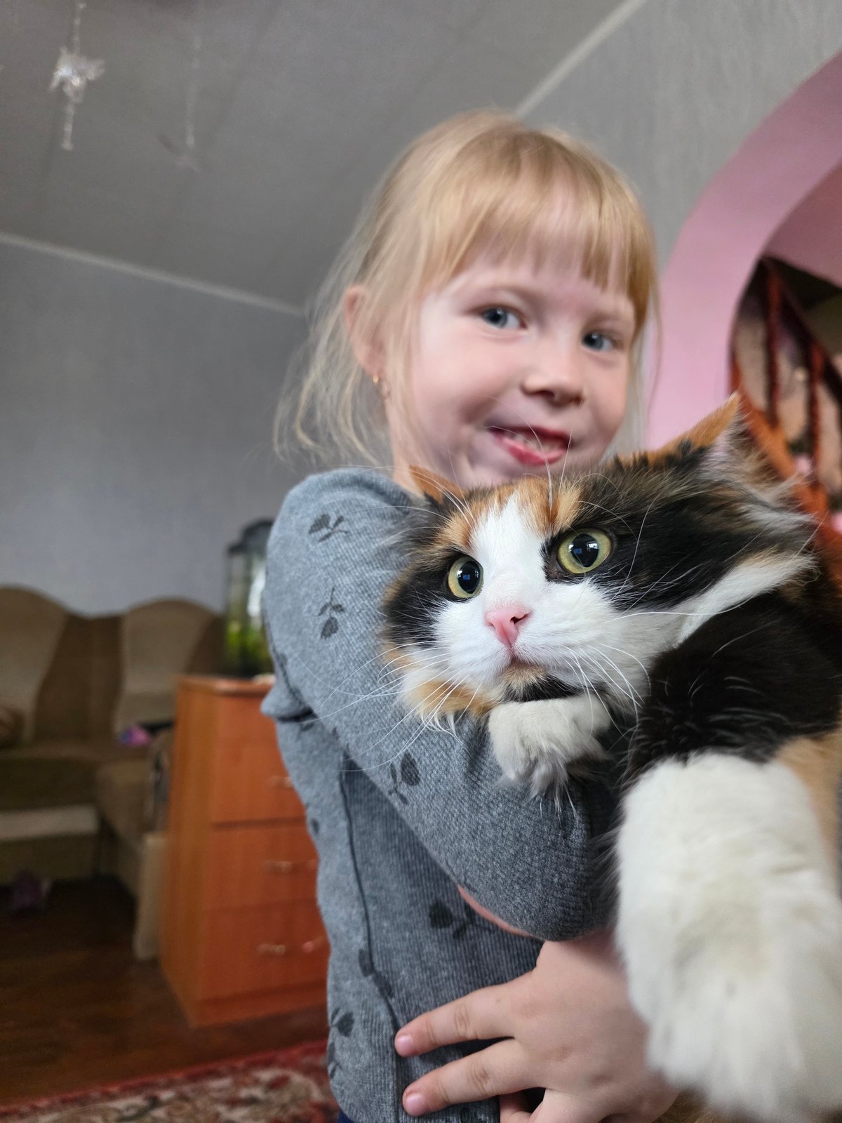 Family moments with pets captured in Chaikovsky home
