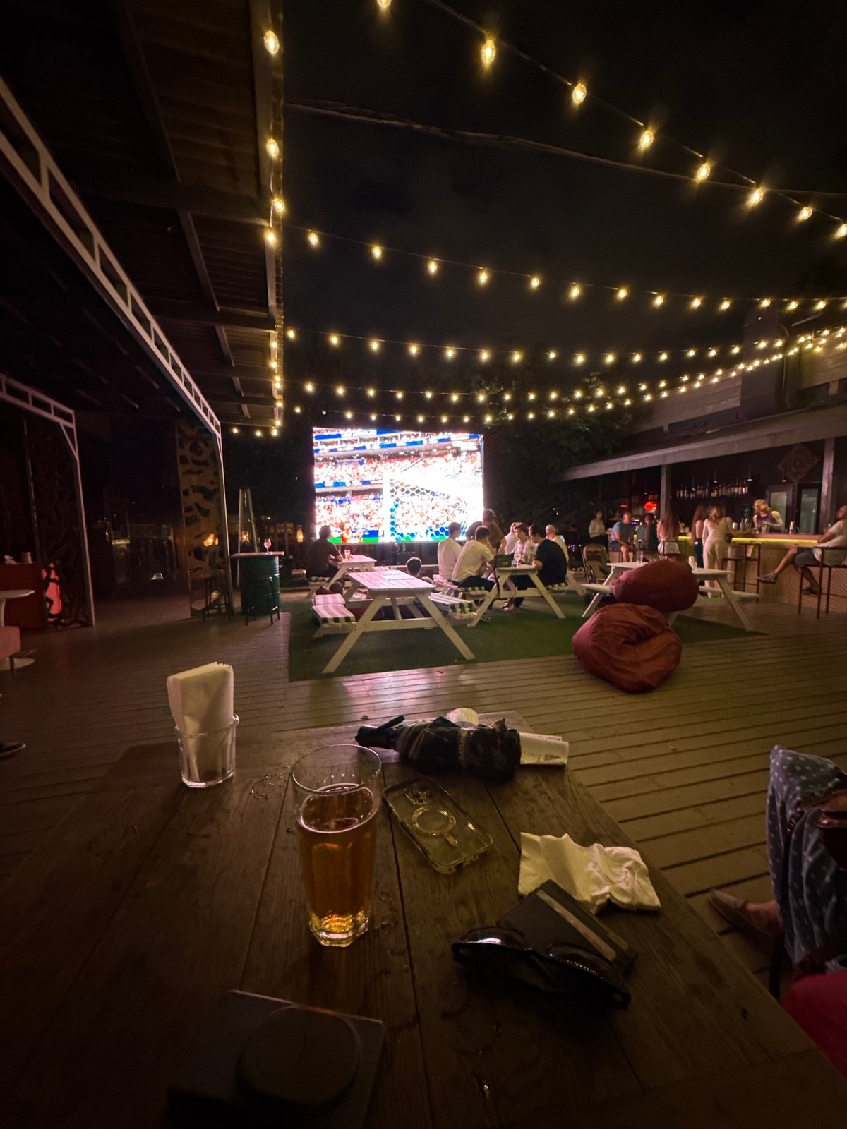 Moscow rooftop bar hosts outdoor soccer viewing on summer night