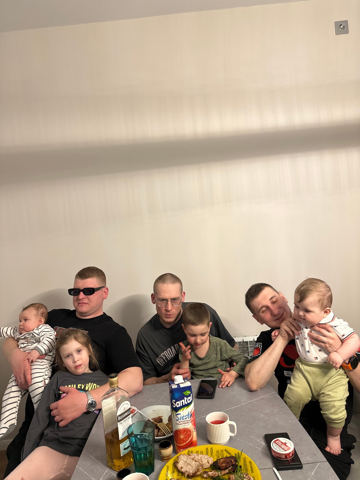 Family gathering documented during mealtime in Chaikovsky home