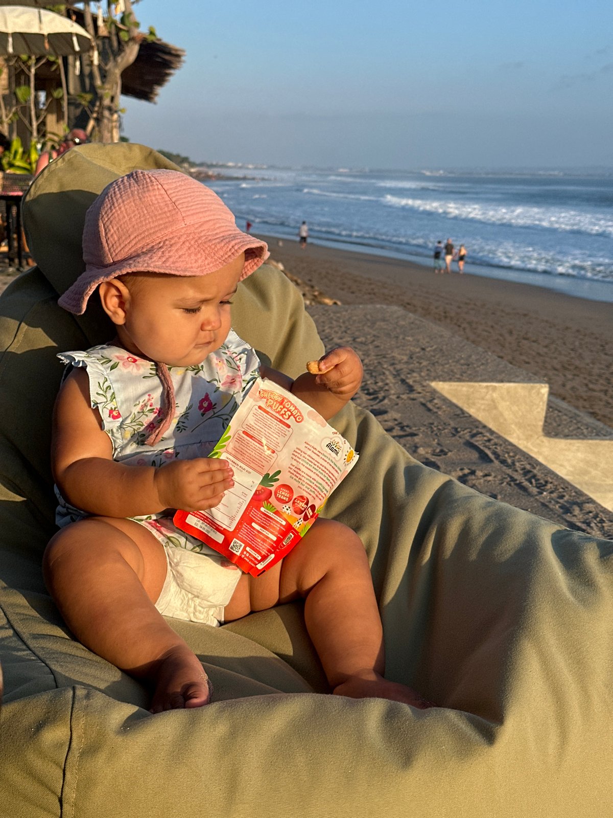 Family enjoys beach day with snacks in North Kuta