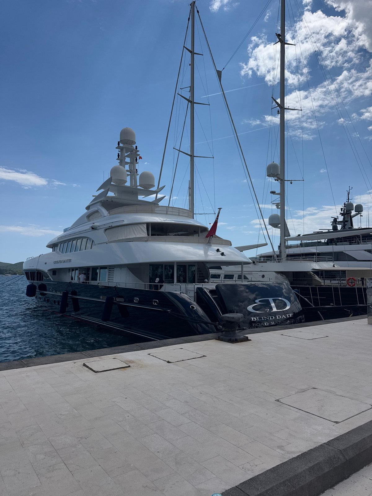 Porto Montenegro's marina promenade on a summer afternoon