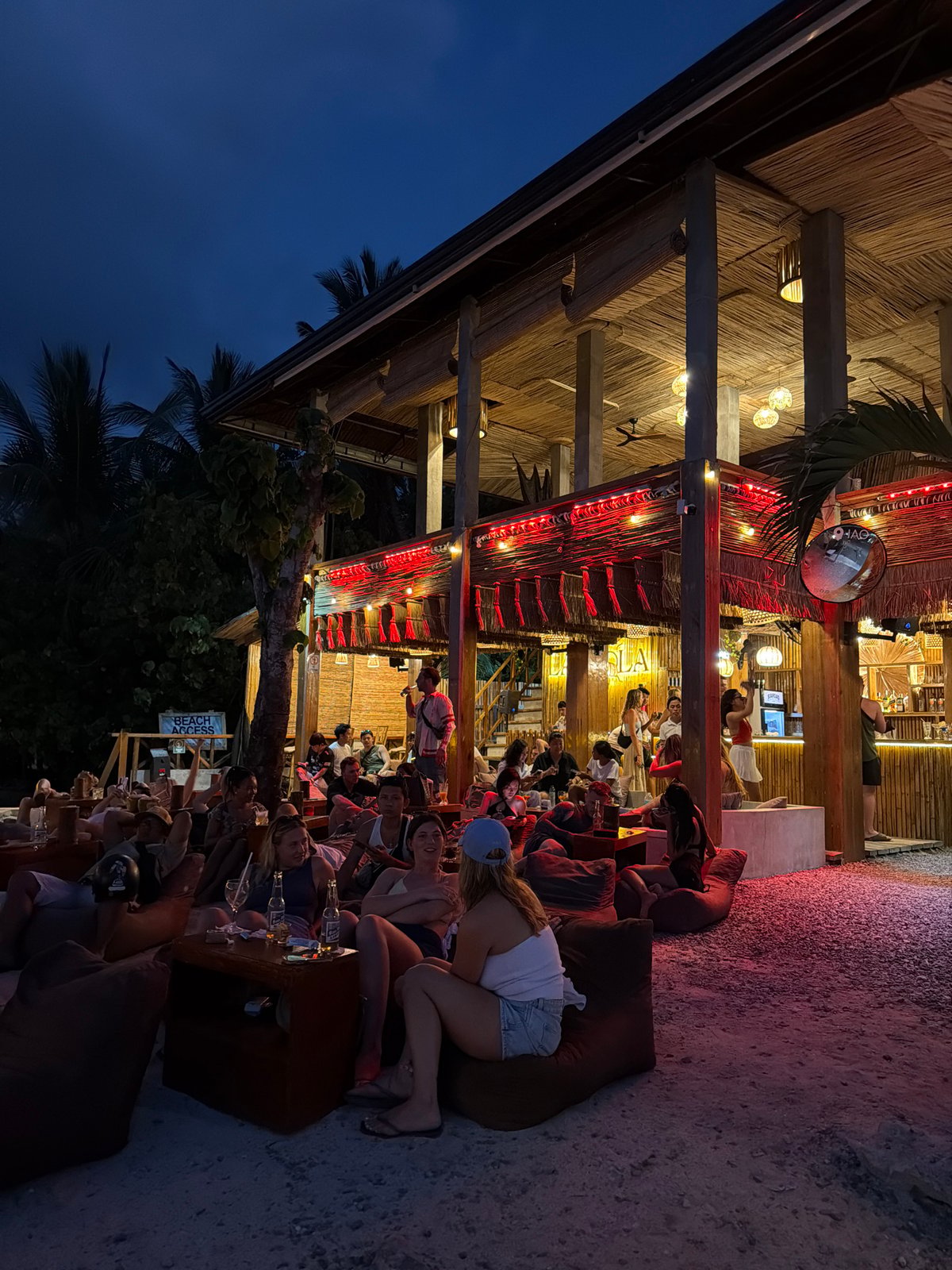 Evening beachfront dining scene documented in General Luna, Philippines