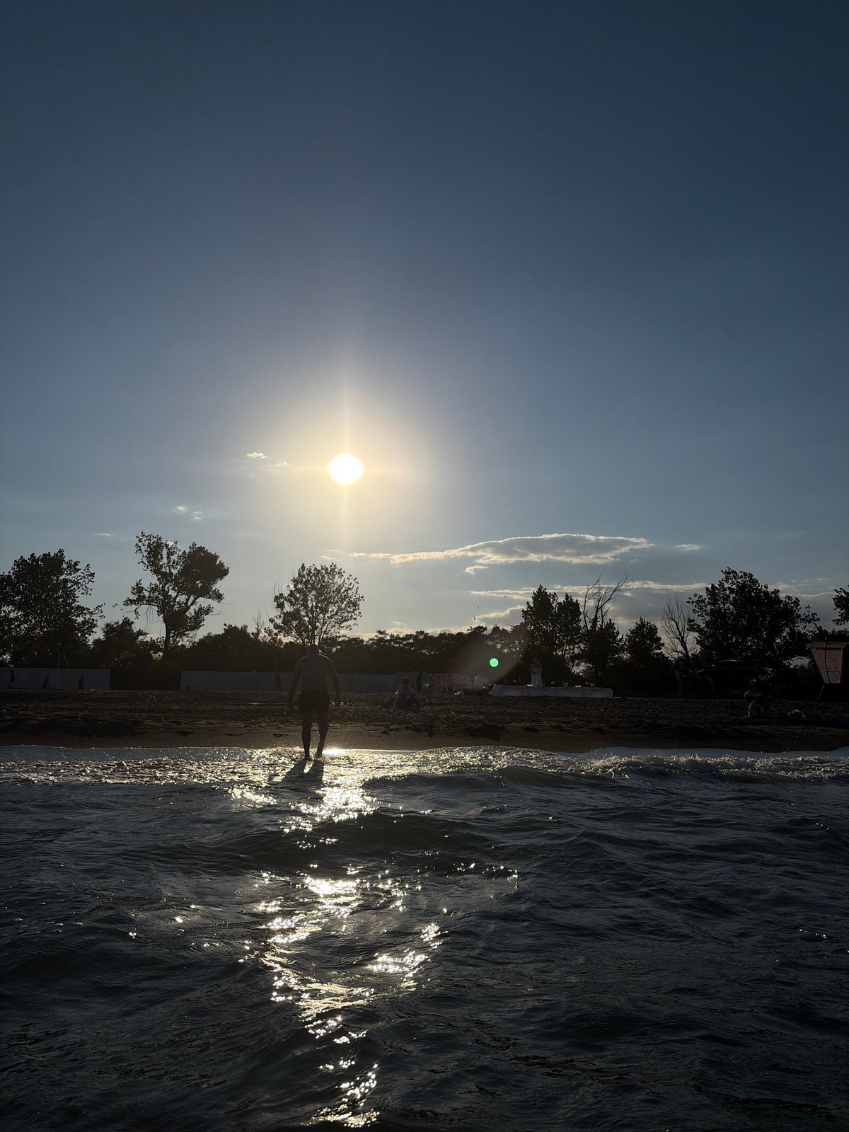 Black Sea beach in Burgas: sunset swim and beachside table setup