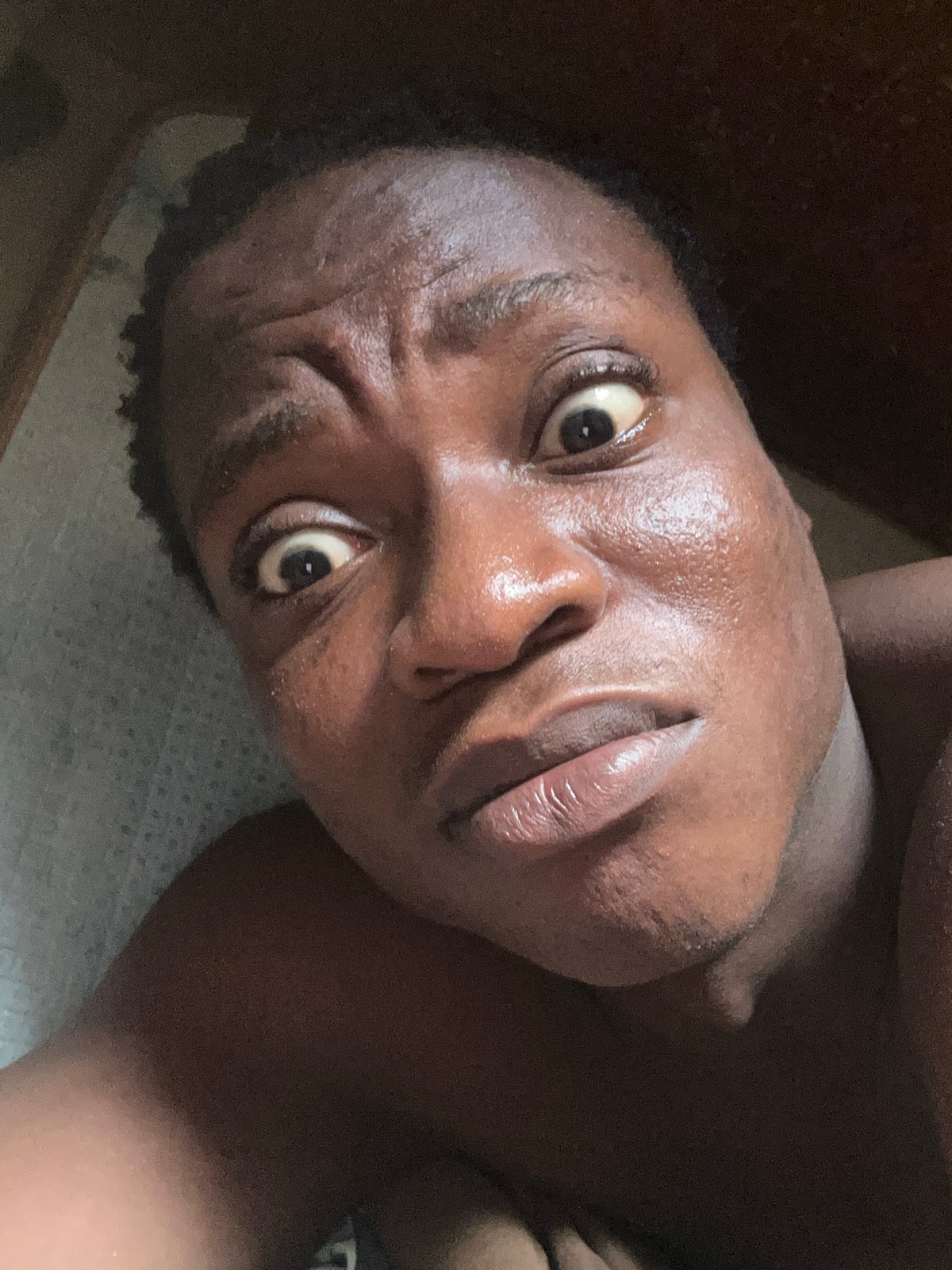 Person displays animated facial expressions in coordinated location