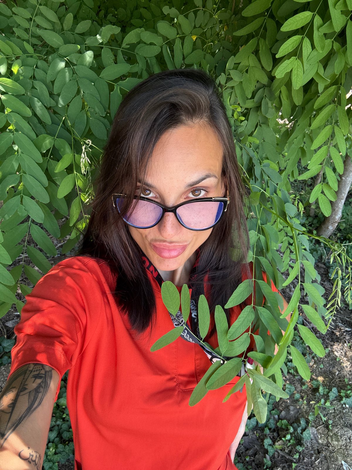 Outdoor selfies near a Pleven medical facility, mid-morning break