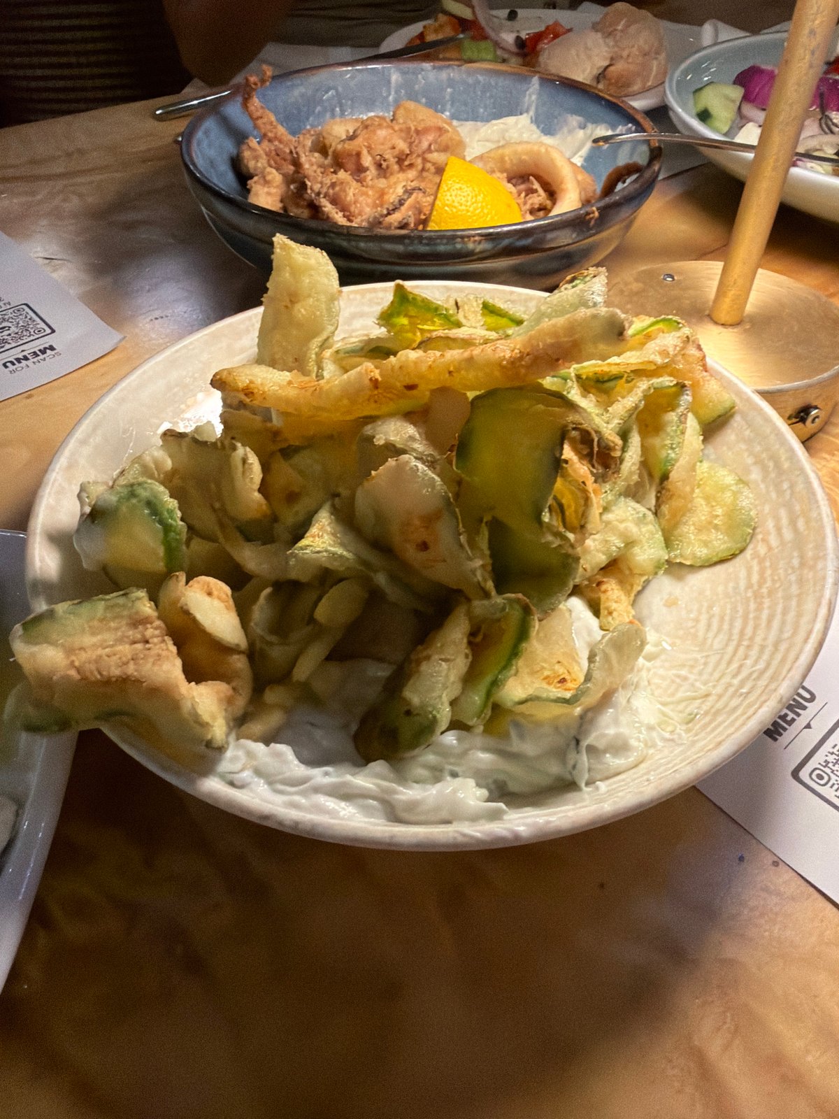 Evening dining experience captured at Greek taverna in Makri