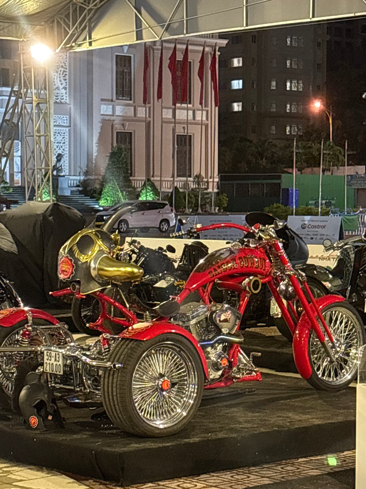 Custom motorcycles displayed at indoor exhibition in Nha Trang