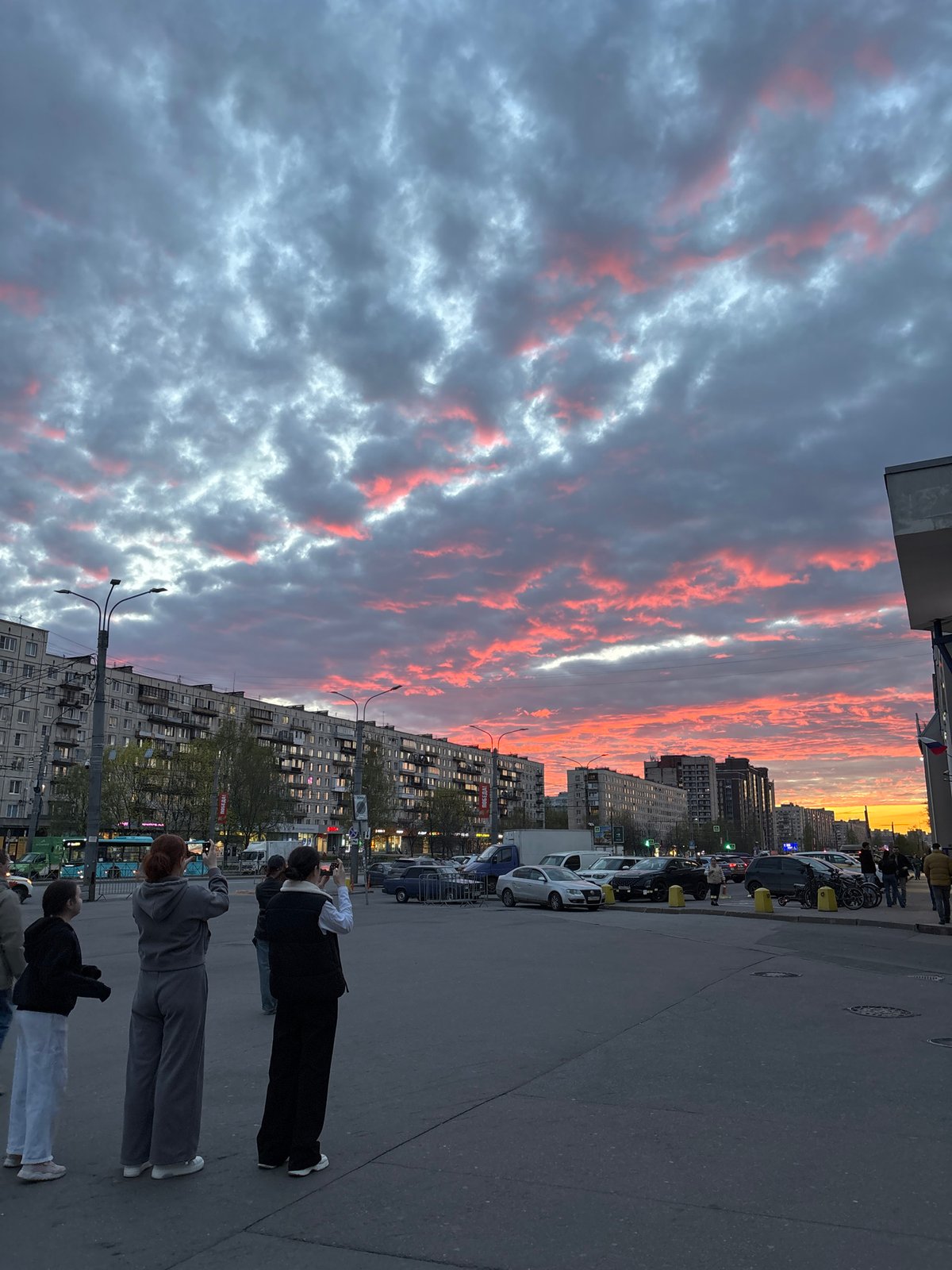 Sunset illuminates Saint Petersburg streets with parked electric scooters