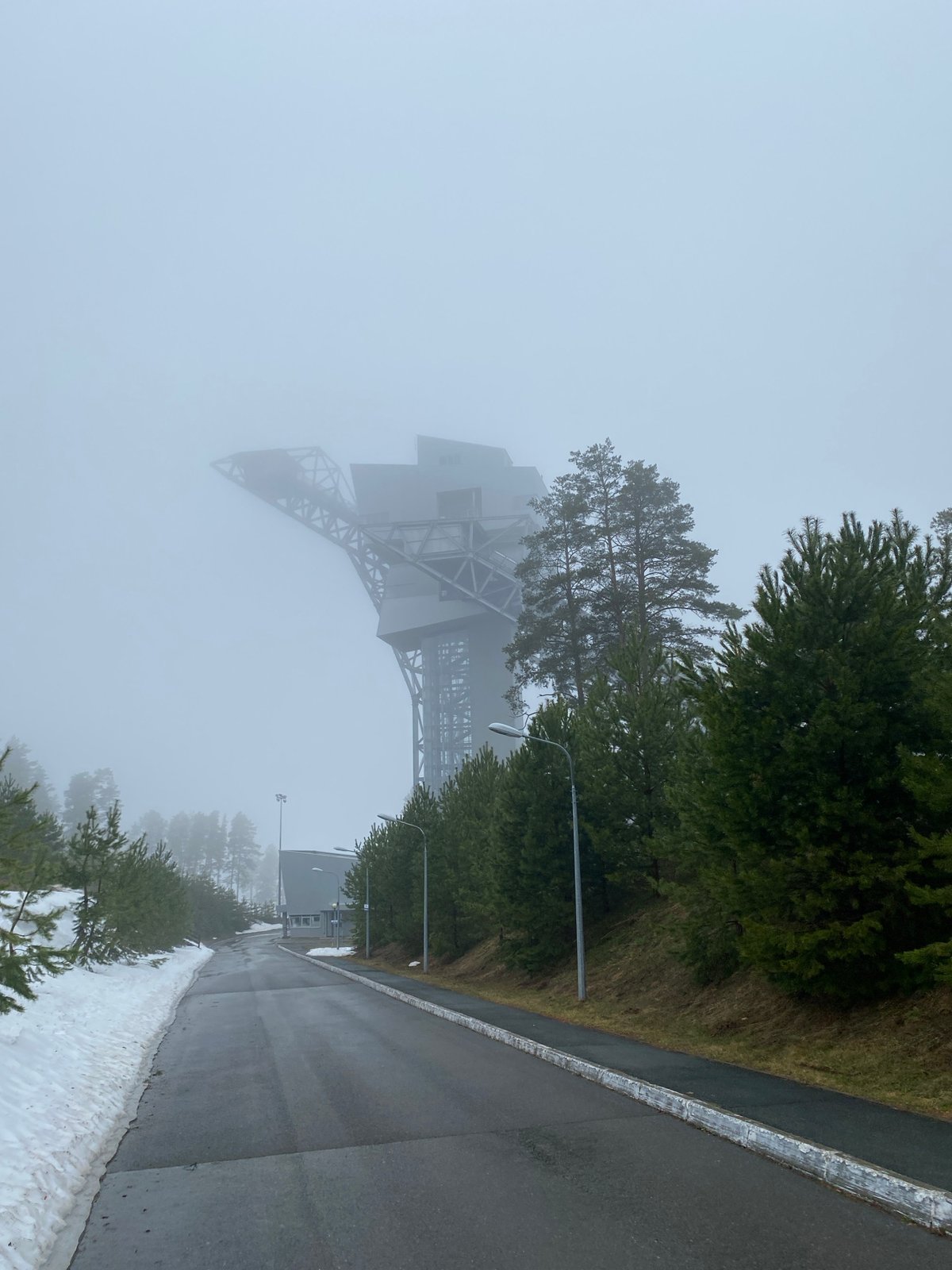 Morning fog shrouds industrial structure in Прикамский, Russia