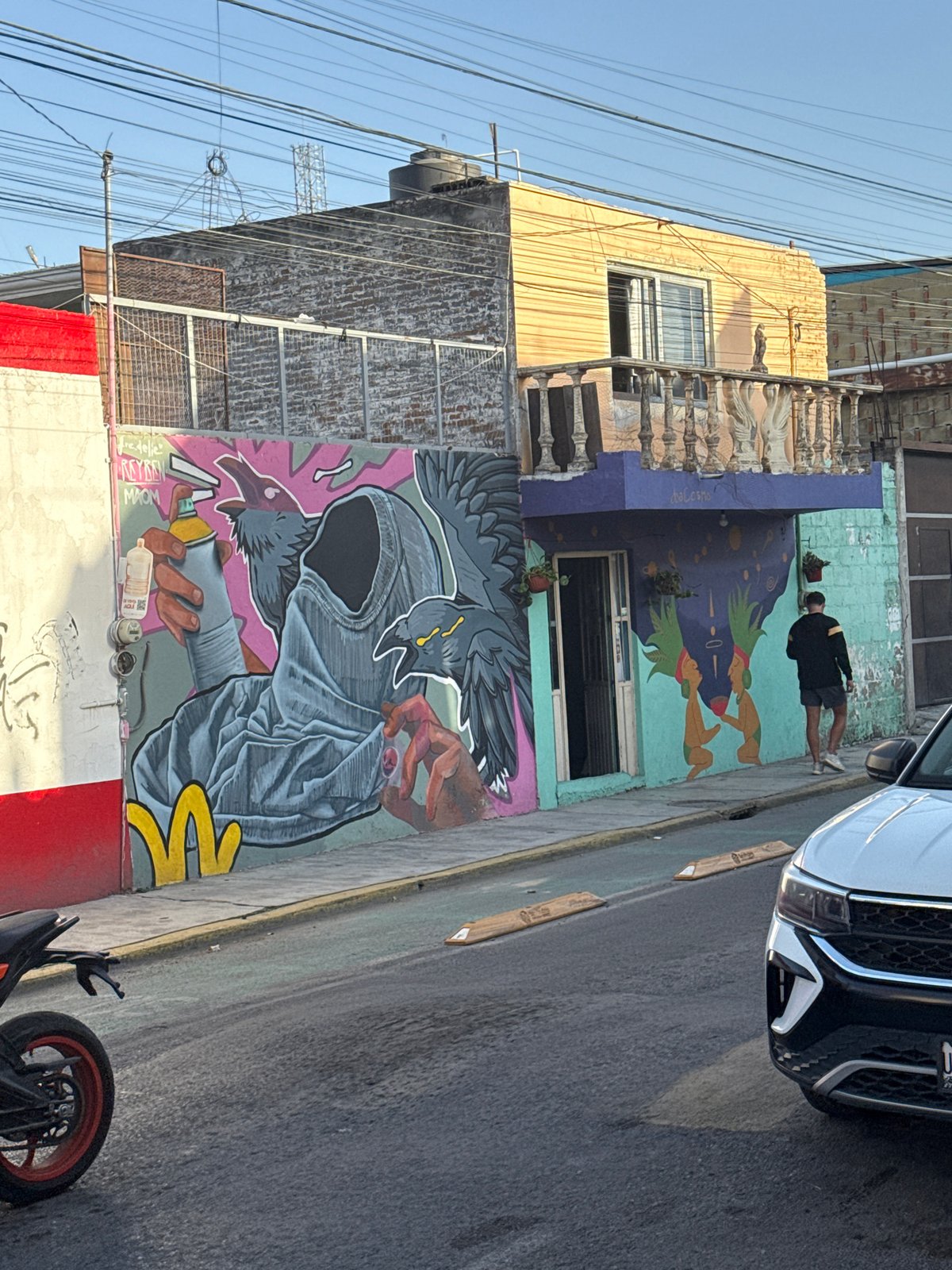 Evening walk documented street art and cafés in Cholula