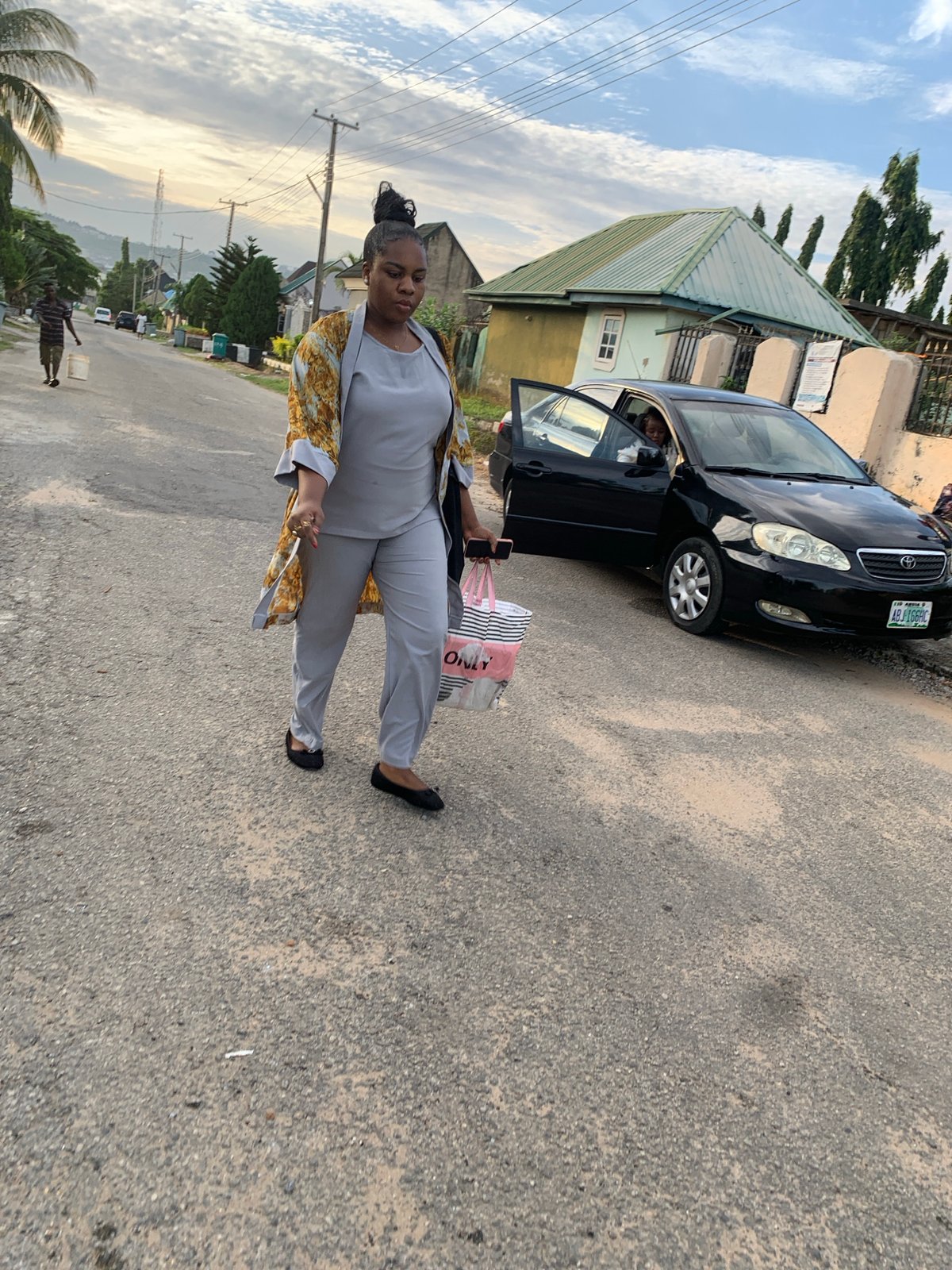 Morning street scenes and portraits in Abuja residential area