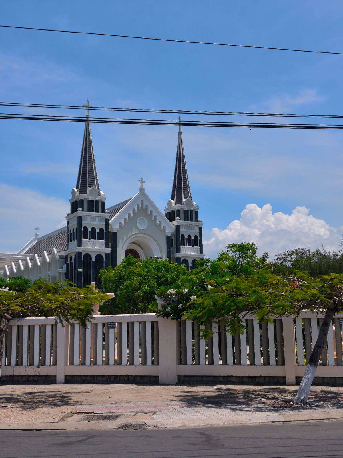 Morning walkthrough of Nha Trang's streets, beach, and a high-rise hotel