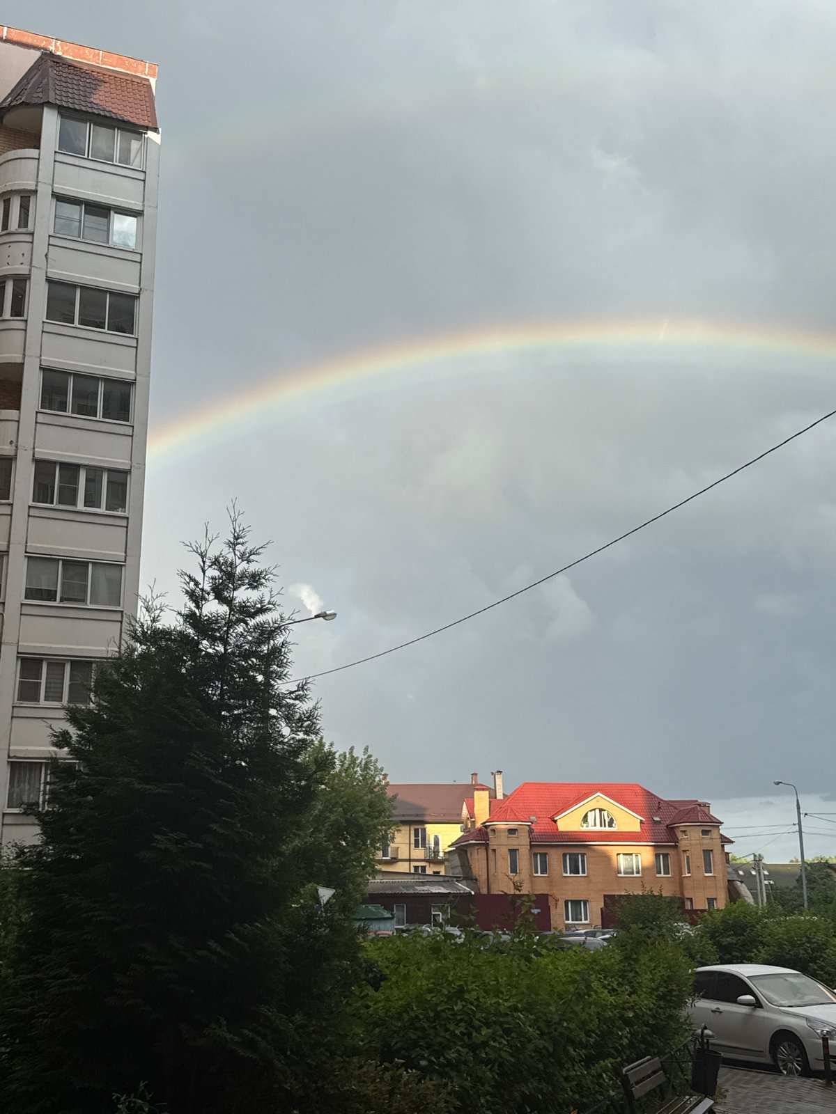 Rainbow over Razvilka's mix of apartments and houses