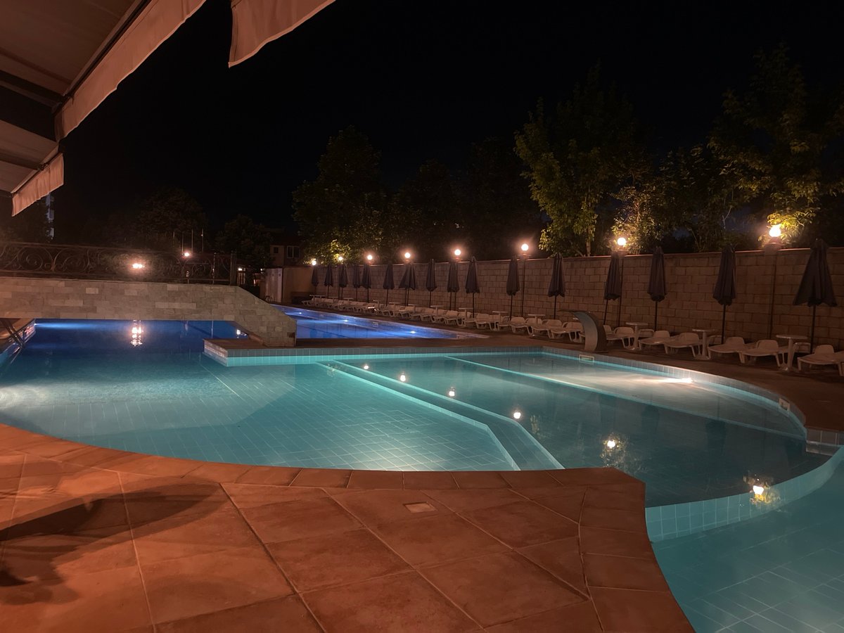 Evening dining and pool time at resort in Ruse