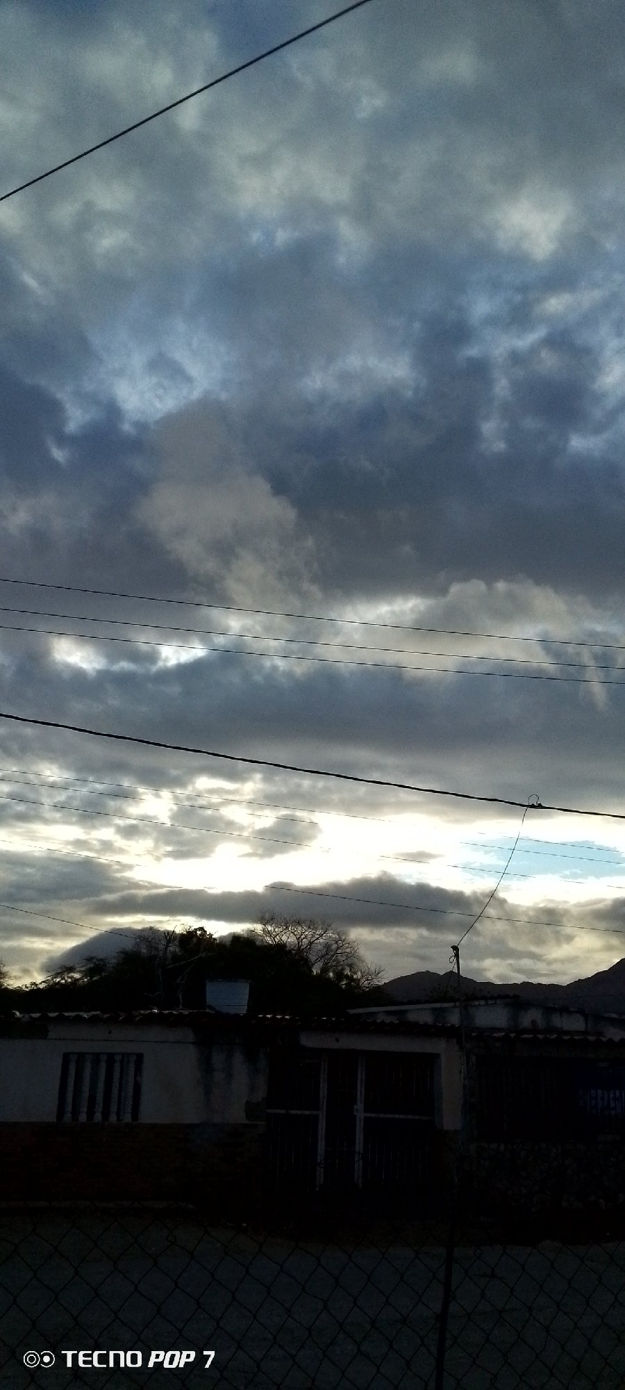 Changing clouds observed over Altagracia, Venezuela residential area