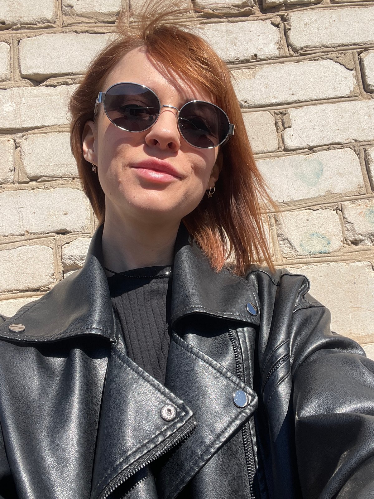 Woman photographed at garage complex in Chaikovsky, Russia