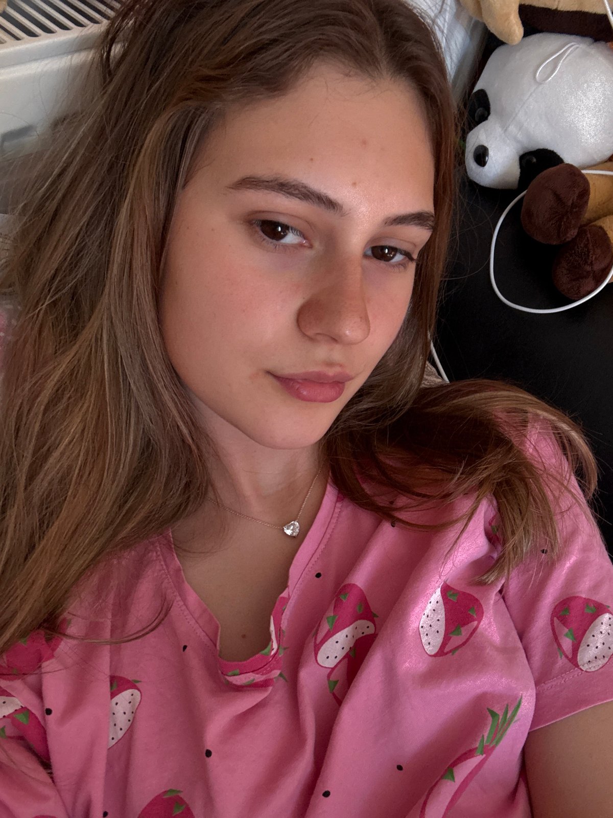 Woman photographed in pink pajamas during afternoon rest in Bulgaria