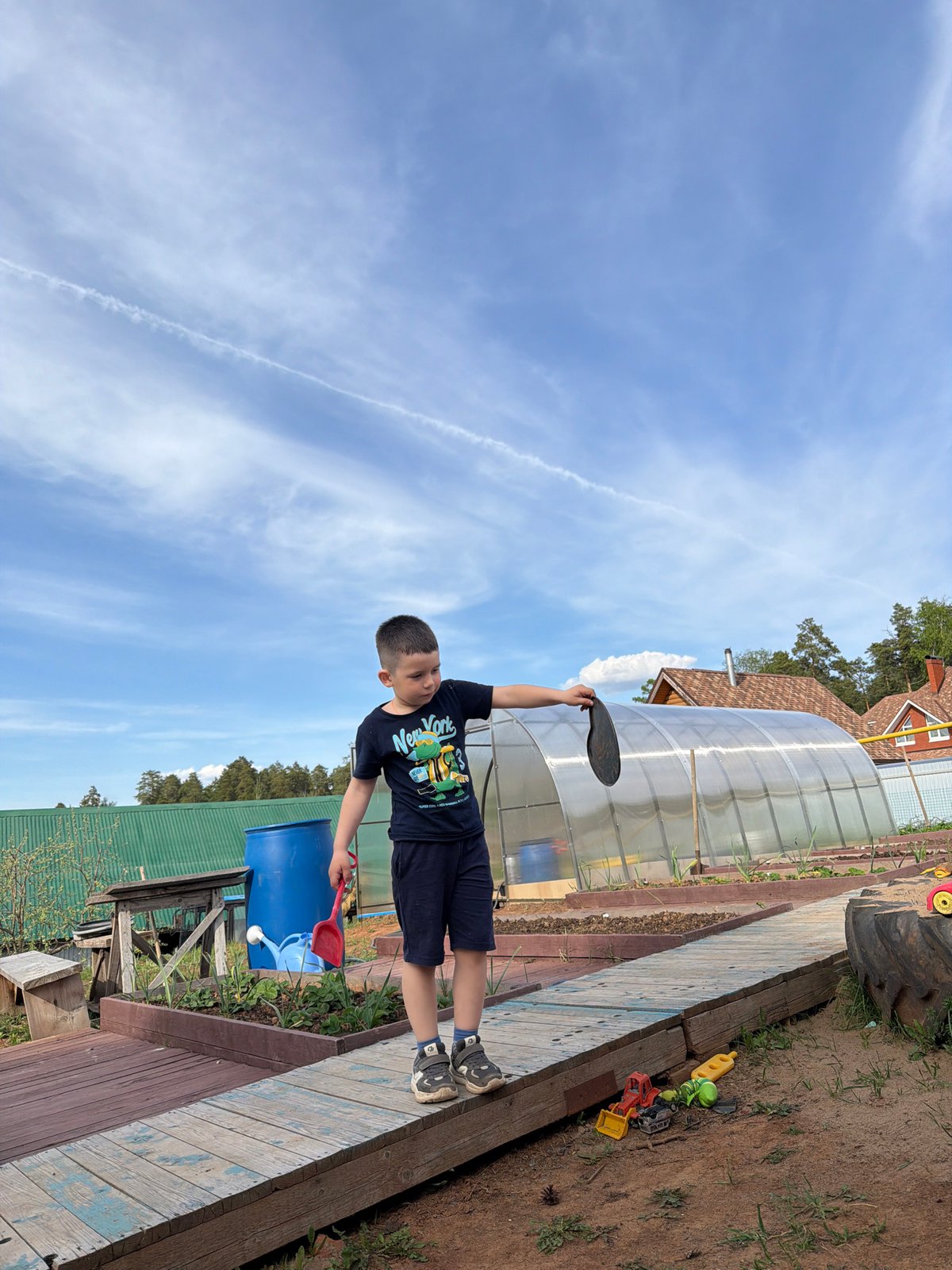 Family enjoys leisurely afternoon activities in Chaikovsky backyard