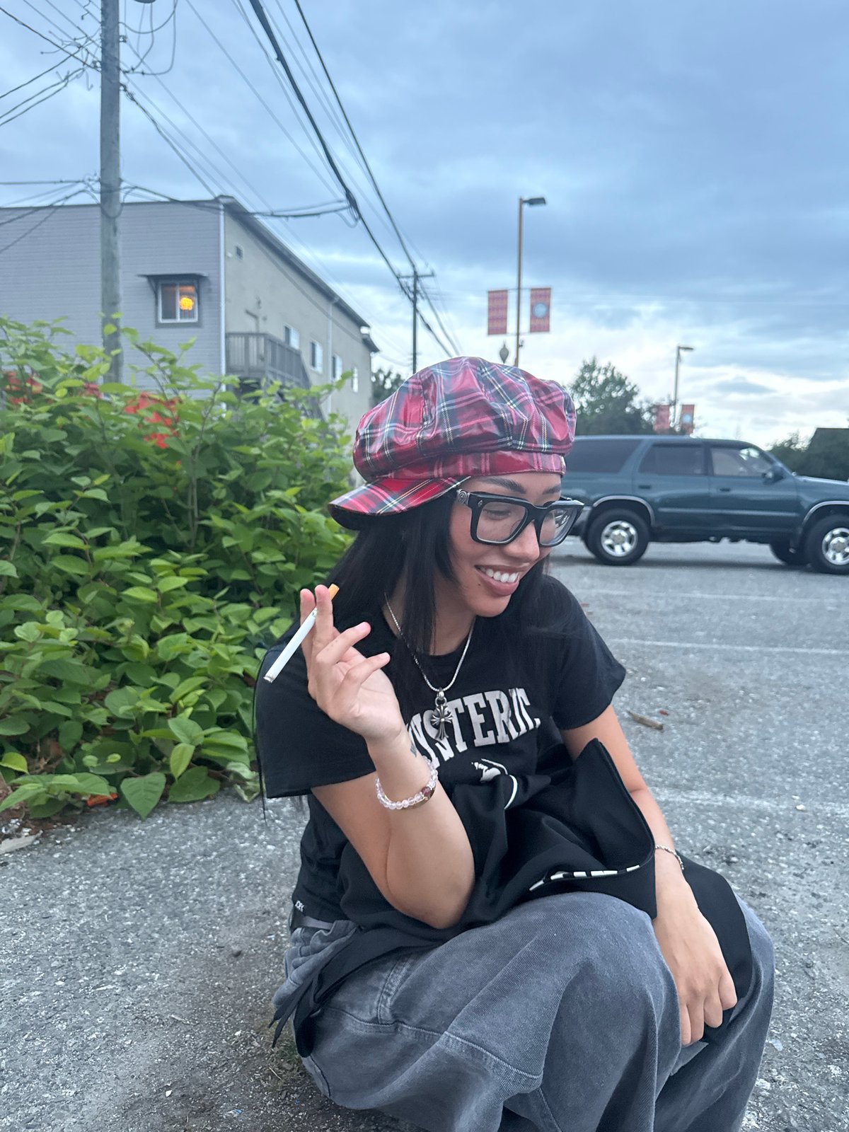 Young person spotted smiling outdoors in Vancouver early morning