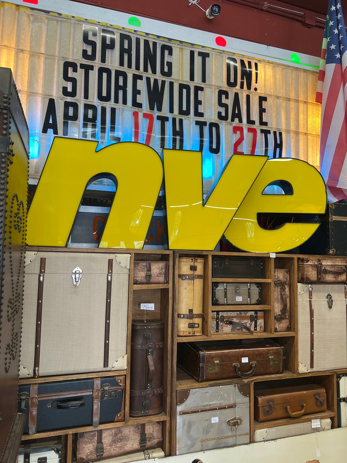 Visitor documents vintage collectibles shop interior in Newburgh, NY