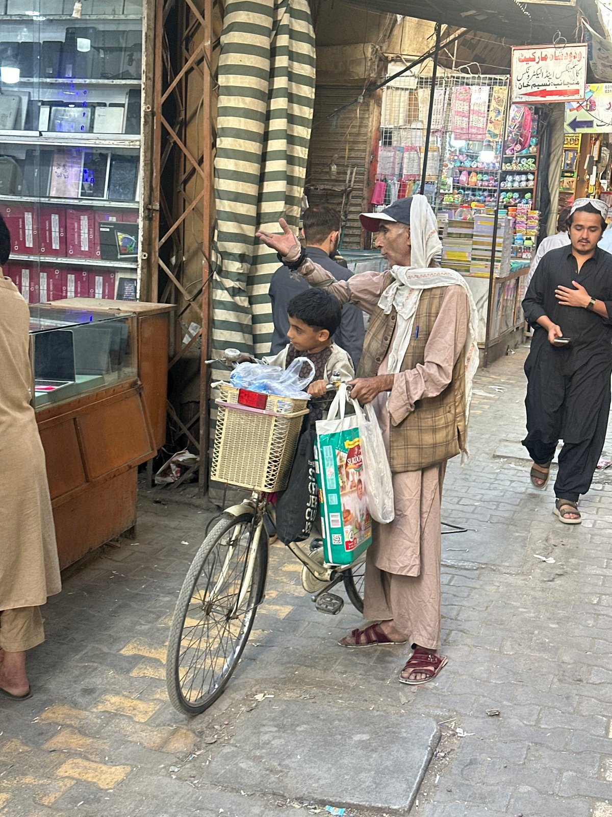 Street interaction and mosque interior in Quetta City