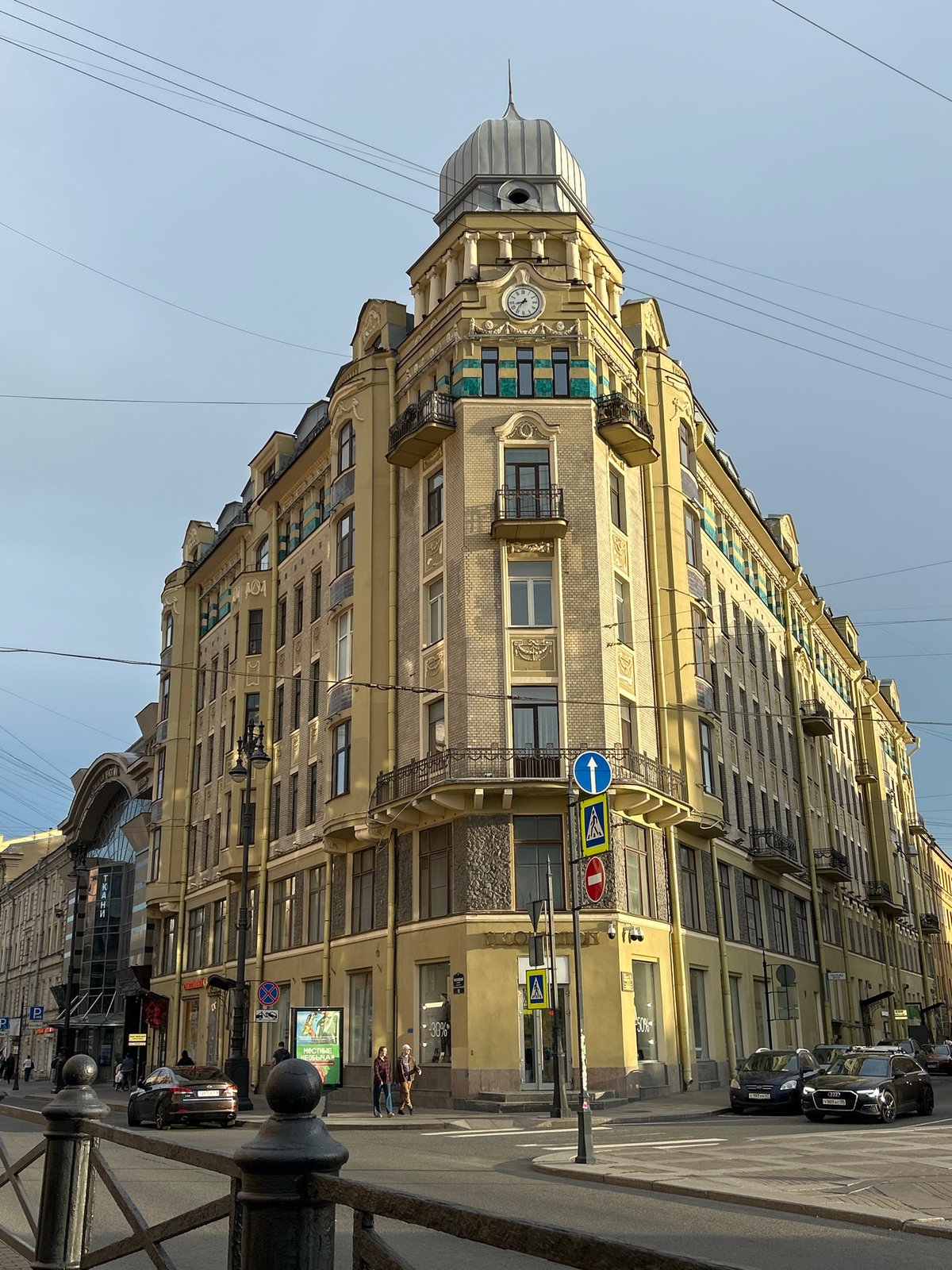 Street-level drift through Saint Petersburg's canals, trams, and ornate facades