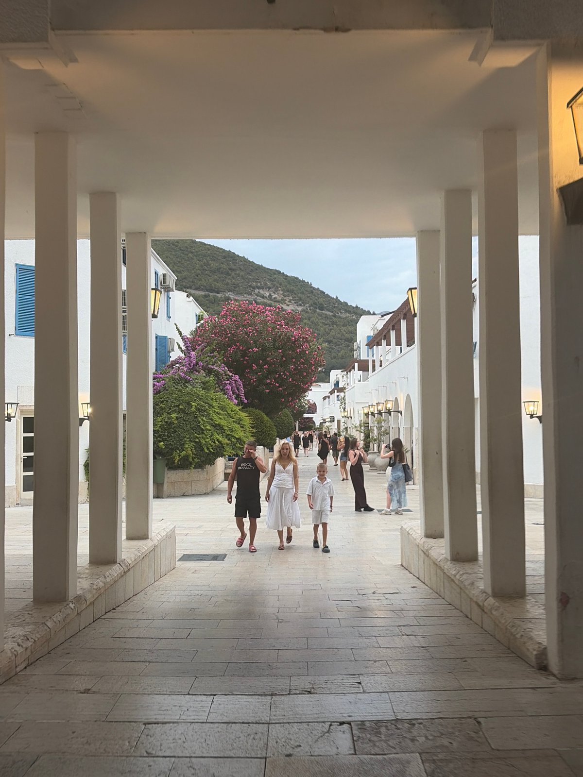 Strolling Budva's whitewashed old town streets on a summer day