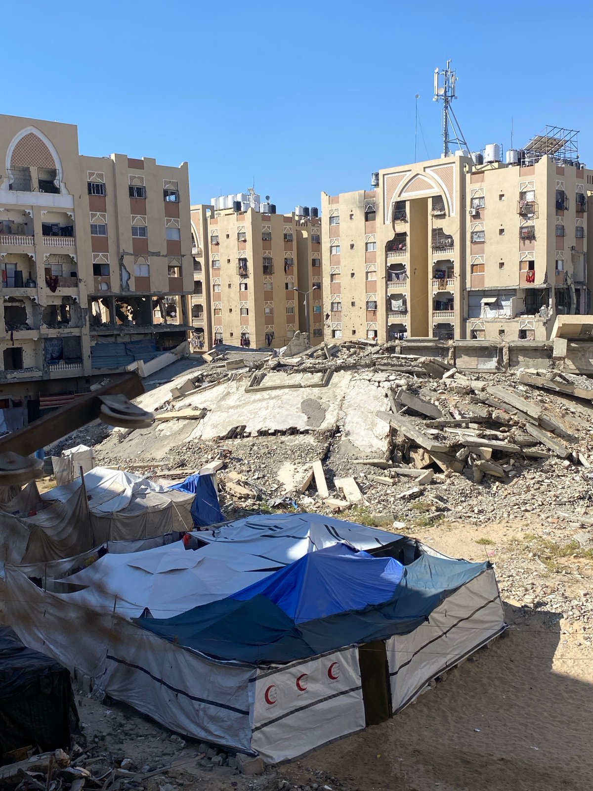 Widespread building damage documented in Khan Yunis with aid tents