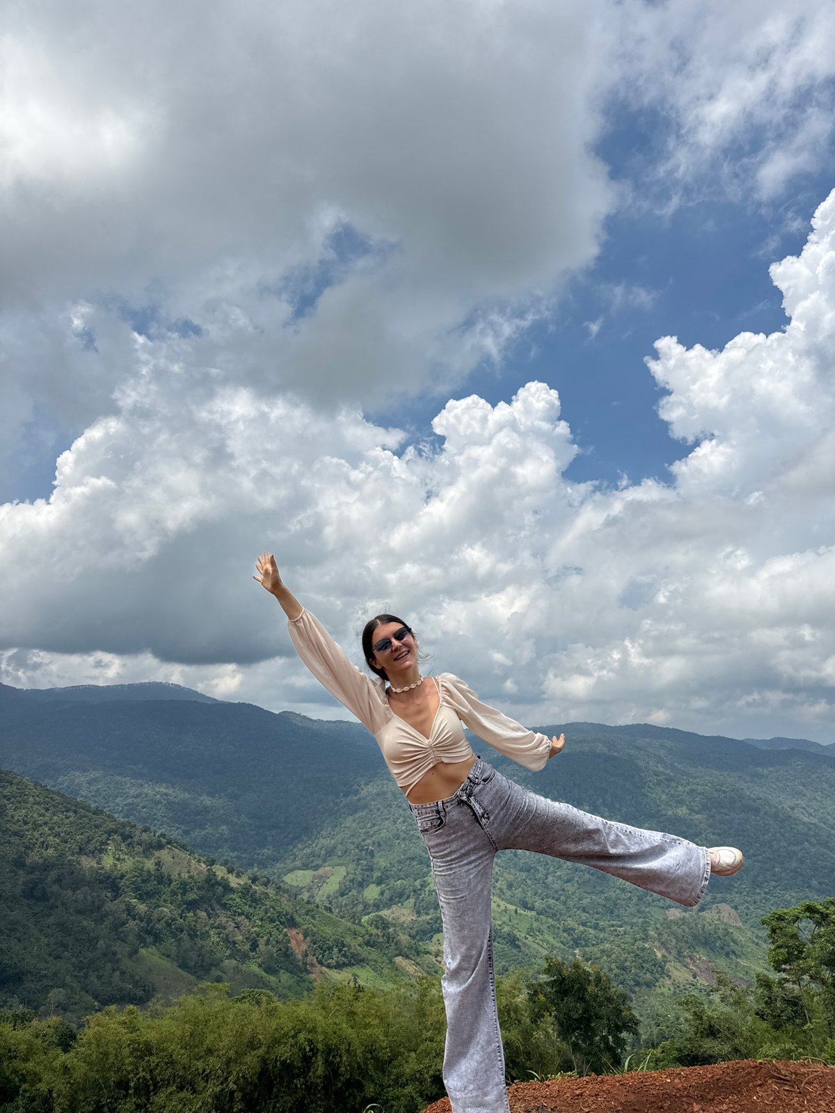 Tourists photograph scenic mountain views in Nao Sẻ Vietnam