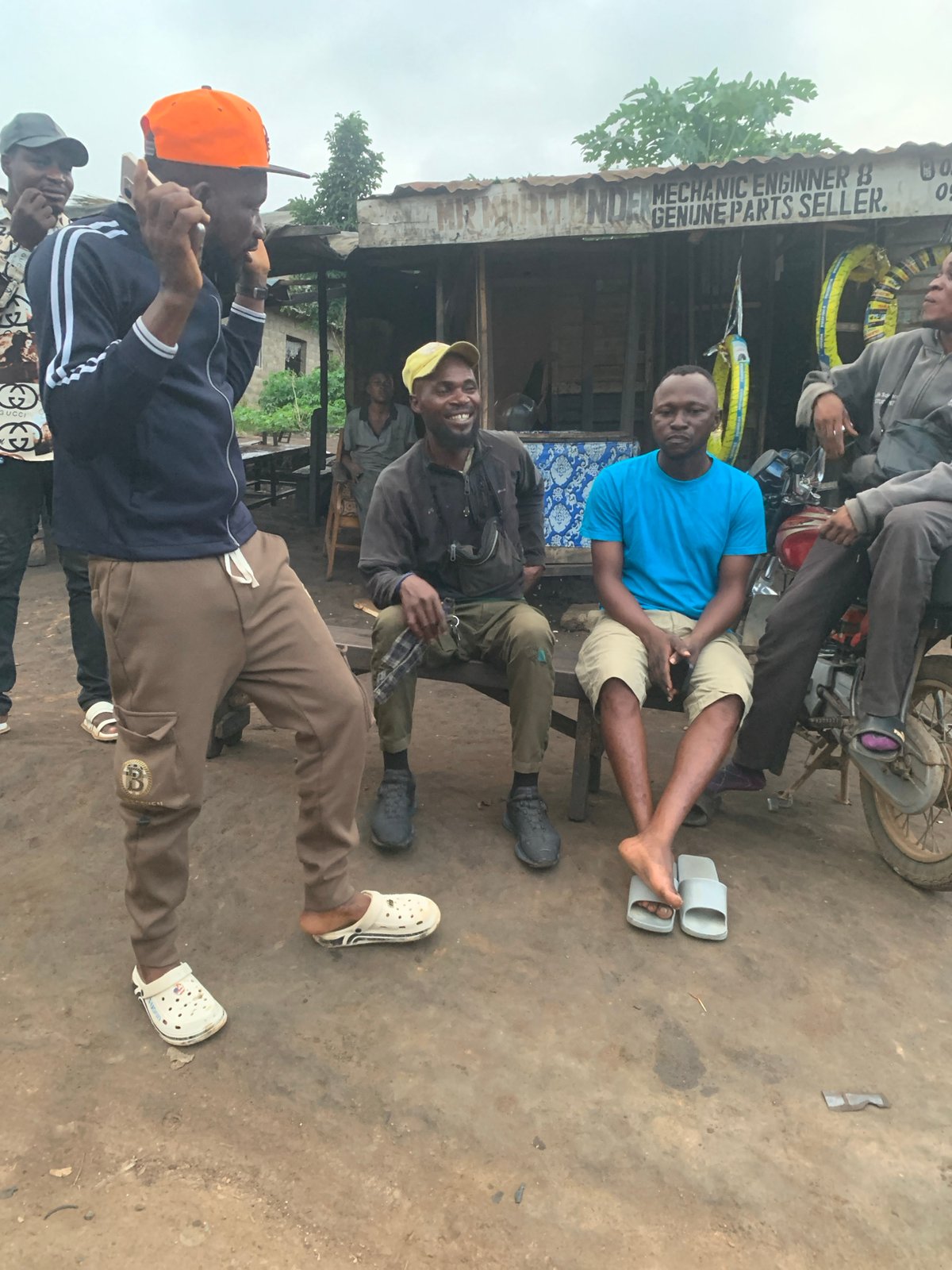 Everyday street life around a Shagamu motorcycle mechanic strip