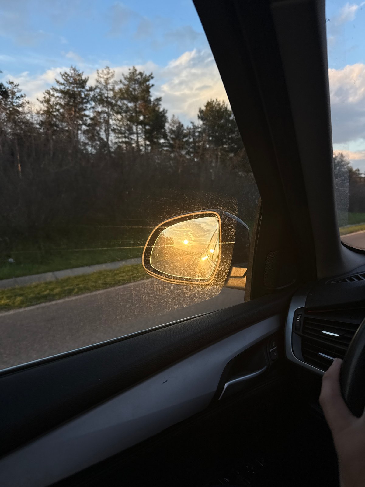 Driver captures sunlit mirror view in Bogomilovo, Bulgaria