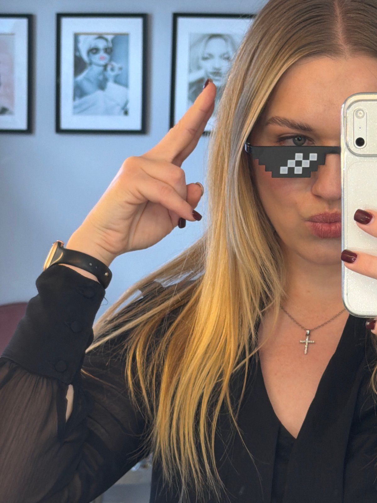 Woman in pixelated sunglasses spotted during eyewear trend in Riga