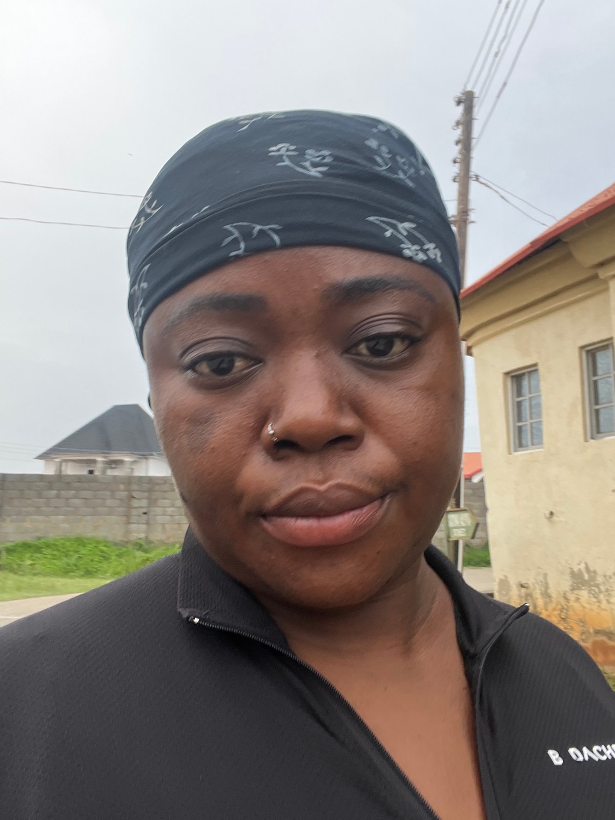 Person documents early morning walk through Abuja residential area
