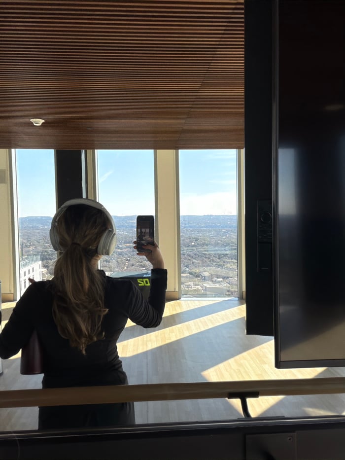 Woman documents evening routine in Austin high-rise building