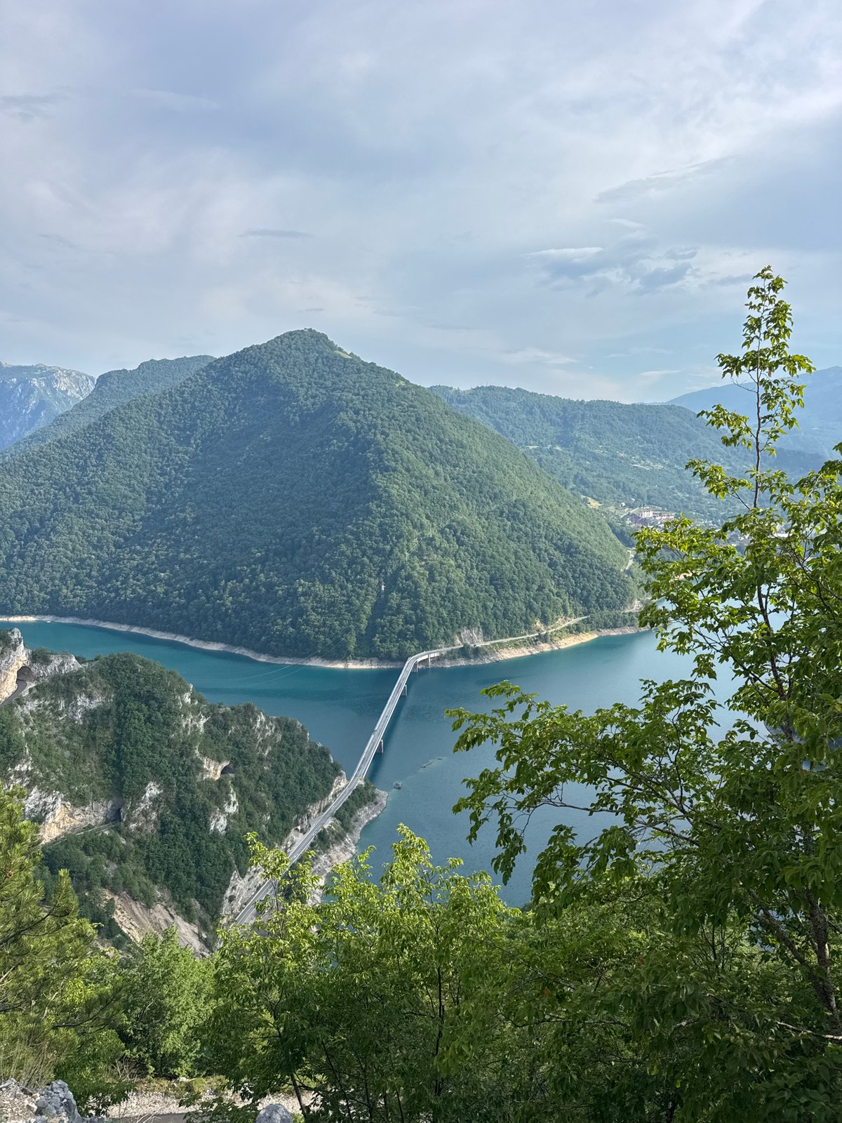 Alpine roads, lakes, and mountain views on a June afternoon