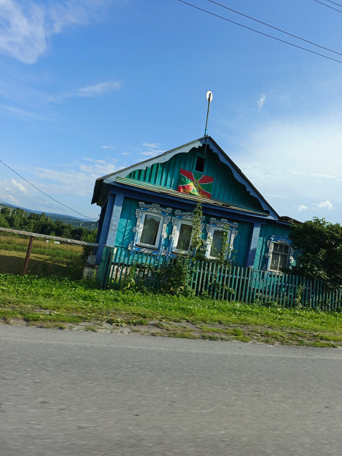 A quiet summer day in a Russian village, rain and all