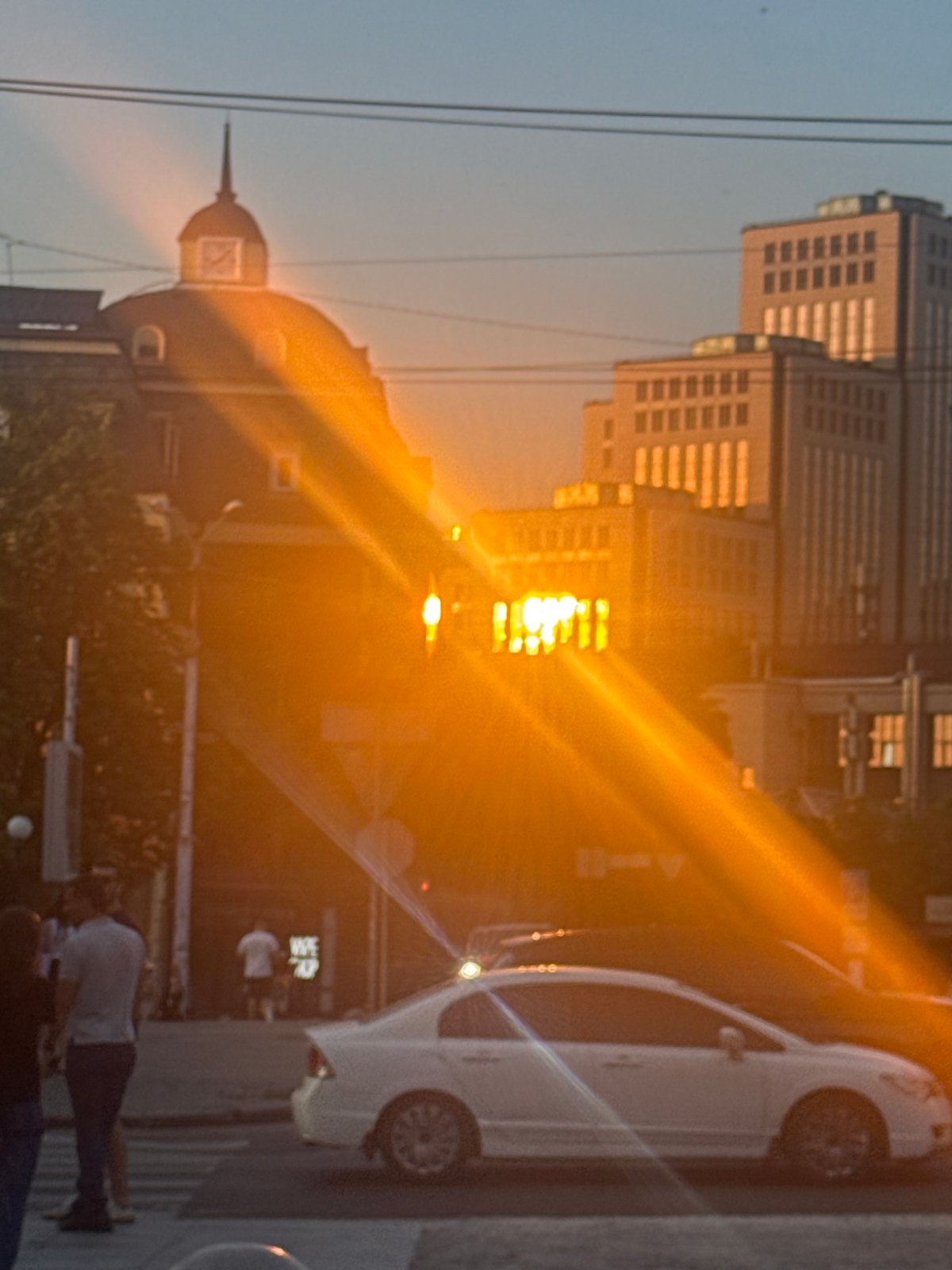 Evening settling over Dnipro's streets, cafes, and corners